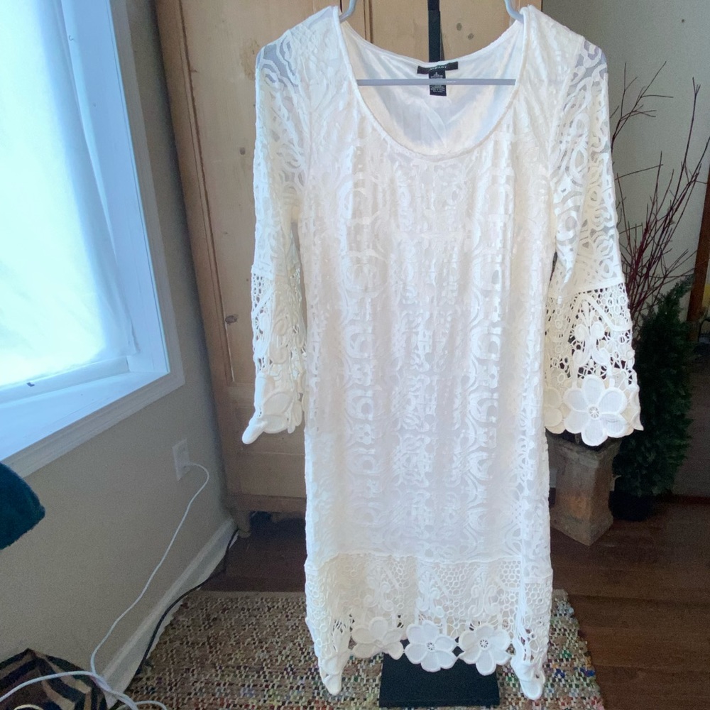 Women’s white crochet trim lace dress with flower trim.long sleeve & knee length